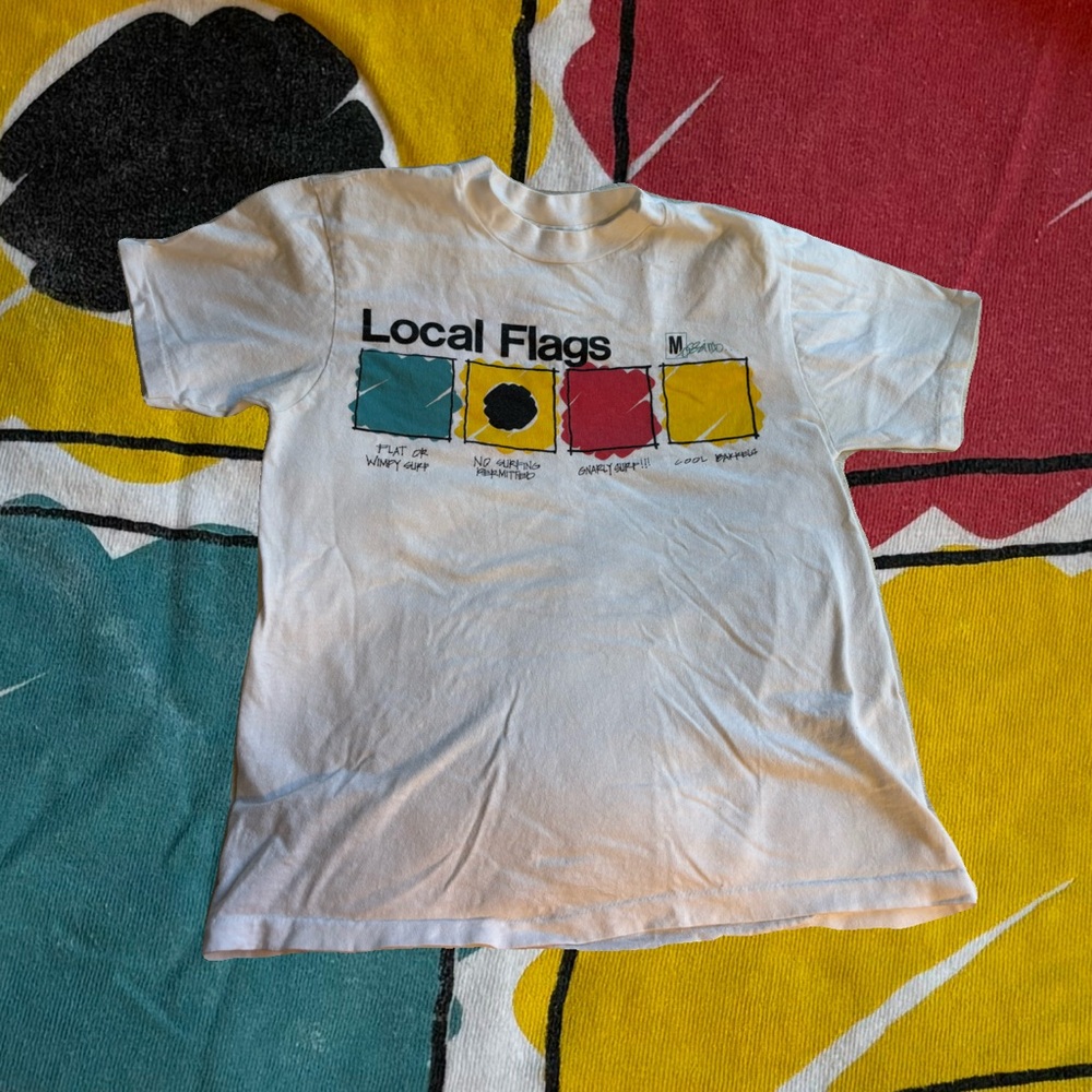 White Graphic T-Shirt with Local Flags Design
